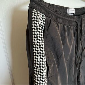 Black track pant with houndstooth side detail